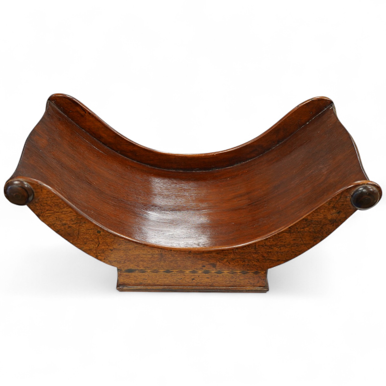 A George III mahogany cheese truckle coaster, 42cm wide